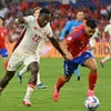 Canada (áo trắng) chia điểm Chile, giành quyền vào tứ kết Copa America 2024. (Nguồn: Getty Images)