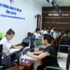 Người dân, doanh nghiệp đến bộ phận một cửa Trung tâm dịch vụ hành chính công tỉnh Lào Cai giải quyết thủ tục hành chính. (Ảnh: Quốc Khánh/TTXVN)