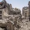 Những tòa nhà bị phá hủy sau các cuộc không kích của Israel xuống thành phố Gaza ngày 4/7/2024. (Ảnh: THX/TTXVN)