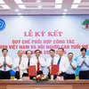 Bảo hiểm xã hội Việt Nam và Hội Người Cao tuổi Việt Nam tổ chức lễ ký Quy chế phối hợp. (Ảnh: PV/Vietnam+)