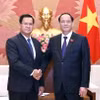 Phó Chủ tịch Quốc hội Trần Quang Phương tiếp Chủ nhiệm Ủy ban Quốc phòng và An ninh của Quốc hội Lào Vongsack Phanthavong. (Ảnh: Doãn Tấn/TTXVN)