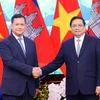 Thủ tướng Phạm Minh Chính và Thủ tướng Campuchia Samdech Hun Manet tại hội đàm. (Ảnh: Dương Giang/TTXVN)