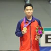 Xạ thủ Phạm Quang Huy giành huy chương Vàng tại ASIAD 2023. (Ảnh: TTXVN phát)