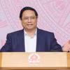 Thủ tướng Phạm Minh Chính, Chủ tịch Ủy ban phát biểu kết luận phiên họp. (Ảnh: Dương Giang/TTXVN)