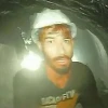 Hình ảnh một công nhân trong đoạn video. (Nguồn: AFP)