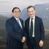Thủ tướng Phạm Minh Chính gặp Thủ tướng Thụy Điển Ulf Kristersson. (Ảnh: Dương Giang/TTXVN)