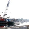Các nhà thầu thi công dự án xây dựng hạ tầng và cải tạo môi trường kênh Tham Lương-Bến Cát-rạch Nước Lên. (Ảnh: Tiến Lực/TTXVN)