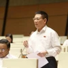 Phó Thủ tướng, Bộ trưởng Bộ Tài chính Hồ Đức Phớc trả lời chất vấn ngày 11/11. (Ảnh: Phương Hoa/TTXVN)