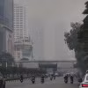 Các toà nhà cao tầng tại đường Nguyễn Chí Thanh, Thủ đô hà Nội, mờ ảo trong lớp sương mù. (Ảnh: Tuấn Đức/TTXVN)