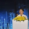 Ông Dương Anh Đức, Phó Chủ tịch UBND thành phố Hồ Chí Minh, thông tin về chiến lược phát triển đô thị thông minh tại hội thảo. (Ảnh: Mỹ Phương/TTXVN)