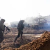 Binh sỹ Israel tiến hành chiến dịch quân sự tại Dải Gaza ngày 23/1 vừa qua. (Ảnh: AFP/TTXVN)