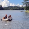 Tìm kiếm nạn nhân bị đuối nước ở Lâm Đồng. (Nguồn: TTXVN)