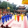 Thực hiện nghi thức tế truyền thống tại lễ Giổ Tổ Hùng Vương. (Ảnh: Trung Kiên/TTXVN)