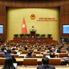 Quốc hội biểu quyết thông qua Luật Đất đai (sửa đổi). (Ảnh: Phạm Kiên/TTXVN)