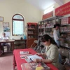 Duy trì hoạt động tại Thư viện cộng đồng tại Hà Nội. (Ảnh: Đinh Thuận/TTXVN)