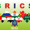 Biểu tượng Nhóm BRICS cùng quốc kỳ các nước thành viên và các nước được mời gia nhập nhóm. (Ảnh: IRNA/TTXVN)