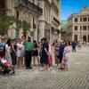 Khách du lịch tham quan La Habana, Cuba. (Ảnh tư liệu: AFP/TTXVN)