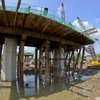 Thi công cầu Xà No Km103+251.71, cao tốc Châu Đốc - Cần Thơ - Sóc Trăng, thuộc địa bàn huyện Châu Thành A, tỉnh Hậu Giang. (Ảnh: Duy Khương/TTXVN)