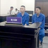 Hai trong số 4 bị cáo tại phiên xử. (Nguồn: Tuổi trẻ Thủ đô) 