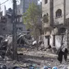 Những tòa nhà bị phá hủy sau cuộc không kích của Israel xuống Dải Gaza, ngày 10/1/2024. (Ảnh: THX/TTXVN)