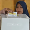 Cử tri Indonesia bỏ phiếu tại điểm bầu cử Tổng thống và bầu cử lập pháp ở Jakarta ngày 17/4/2019. (Ảnh tư liệu: AFP/TTXVN)