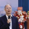 Vụ trưởng Vụ Vật liệu xây dựng (Bộ Xây dựng) Lê Trung Thành phát biểu. (Ảnh: Tuấn Anh/TTXVN)