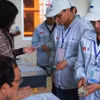 Lao động Việt Nam làm thủ tục sang Hàn Quốc làm việc (Ảnh: PV/vietnam+)