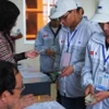 Lao động Việt Nam làm thủ tục sang Hàn Quốc làm việc (Ảnh: PV/vietnam+)