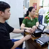 Làm thủ tục định danh cá nhân. (Nguồn: TTXVN)