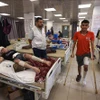 Bệnh nhân được điều trị tại một bệnh viện ở Dải Gaza ngày 24/4/2024. (Ảnh: AFP/TTXVN)