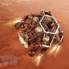 Tàu thăm dò Perseverance tiến gần tới bề mặt sao Hỏa. (Ảnh: THX/TTXVN)