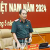 Thượng tướng Phùng Sĩ Tấn, Phó Tổng Tham mưu trưởng Quân đội nhân dân Việt Nam chủ trì Hội nghị thông qua phương án gian hàng kinh tế - quốc phòng tại Triển lãm Quốc phòng quốc tế Việt Nam 2024. (Nguồn: TTXVN)