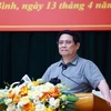 Thủ tướng Phạm Minh Chính phát biểu tại cuộc làm việc với Ban Thường vụ Tỉnh ủy Hòa Bình. (Ảnh: Dương Giang/TTXVN)