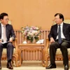 Phó Thủ tướng Trịnh Đình Dũng tiếp ông Lee Kwang-young, Tổng Giám đốc điều hành Công ty Lotte Asset Development Co., Ltd, thuộc Tập đoàn Lotte. (Ảnh: TTXVN)