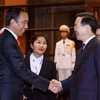 Chủ tịch nước Võ Văn Thưởng và Tổng thống Indonesia Joko Widodo. (Ảnh: Thống Nhất/TTXVN)