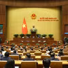 Chiều 16/1, tại Hà Nội, Quốc hội thảo luận về dự thảo Nghị quyết về một số cơ chế, chính sách đặc thù để tháo gỡ khó khăn, vướng mắc, đẩy nhanh tiến độ thực hiện các chương trình mục tiêu quốc gia; việc bổ sung Kế hoạch đầu tư công trung hạn vốn ngân sách trung ương giai đoạn 2021-2026 và bổ sung Kế hoạch đầu tư công trung hạn cho Tập đoàn Điện lực Việt Nam. (Ảnh: TTXVN)