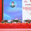 Đại tướng Lương Cường và Chủ tịch Hội đồng Lý luận Trung ương Nguyễn Xuân Thắng cùng các đại biểu chủ trì hội thảo. (Ảnh: Trọng Đức/TTXVN)