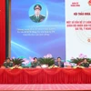 Đại tướng Lương Cường và Chủ tịch Hội đồng Lý luận Trung ương Nguyễn Xuân Thắng cùng các đại biểu chủ trì hội thảo. (Ảnh: Trọng Đức/TTXVN)