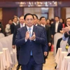 Thủ tướng Phạm Minh Chính đến dự hội nghị. (Ảnh: Dương Giang/TTXVN)