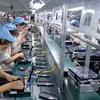 Tính chung trong năm tháng, các nhà đầu tư nước ngoài xuất siêu gần 20 tỷ USD kể cả dầu thô. (Ảnh: TTXVN)