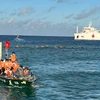 Sau 47 giờ lênh đênh trên biển, tàu 561 đưa Đoàn công tác số 11 đến với đảo Sinh Tồn Đông. (Ảnh: Hạnh Nguyễn/Vietnam+)