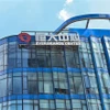 Tòa nhà trung tâm của Tập đoàn Bất động sản Evergrande ở Thượng Hải, Trung Quốc. (Ảnh: AFP/TTXVN)
