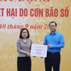 Thông tấn xã Việt Nam ủng hộ đồng bào bị thiệt hại do cơn bão số 3. (Ảnh: Phương Hoa/TTXVN)