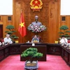 Thủ tướng Phạm Minh Chính chủ trì cuộc họp giữa Thường trực Chính phủ với Thường trực Tiểu ban Kinh tế-Xã hội. (Ảnh: Dương Giang/TTXVN)