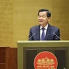 Phó Thủ tướng Lê Minh Khái, thừa ủy quyền của Thủ tướng Chính phủ trình bày Báo cáo đánh giá bổ sung kết quả thực hiện kế hoạch phát triển kinh tế-xã hội và ngân sách nhà nước năm 2023; tình hình thực hiện kế hoạch phát triển kinh tế-xã hội và ngân sách nhà nước những tháng đầu năm 2024. (Ảnh: TTXVN)