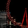 Vòng quay London Eye chuyển màu đỏ và vàng trong dịp Tết Nguyên đán. (Nguồn: Xihua)