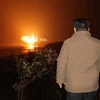 Nhà lãnh đạo Triều Tiên Kim Jong-un thị sát vụ phóng vệ tinh trinh sát “Malligyong-1” tại Bãi phóng vệ tinh Sohae ở quận Cholsan, tỉnh Bắc Phyongan, ngày 21/11/2023. (Nguồn: Yonhap/TTXVN) 