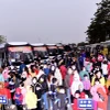 Hàng ngàn công nhân lao động Thủ đô khó khăn được hỗ trợ phương tiện về quê đón Tết. (Ảnh: TTXVN phát)
