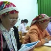 Học viên tại lớp học xóa mù chữ. (Nguồn: TTXVN phát) 