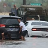 Ngập lụt do mưa lớn ảnh hưởng của bão Hilary ở Palm Springs, California, Mỹ, ngày 20/8/2023. (Nguồn: AFP/TTXVN)